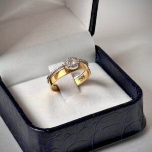 Anillo doble cintillo de oro amarillo y oro blanco